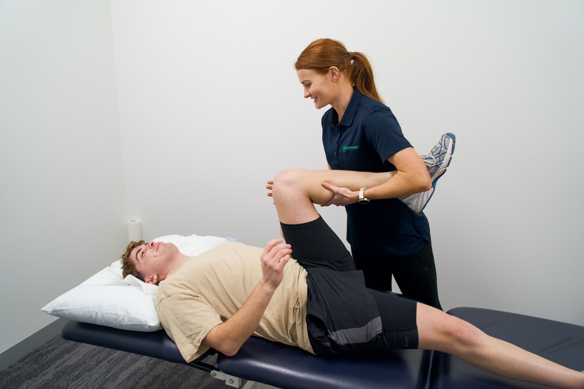 Physiotherapist working on a P4 client